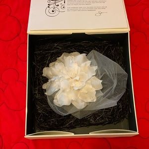 Sara Gabriel Bridal fascinator with birdcage Veil